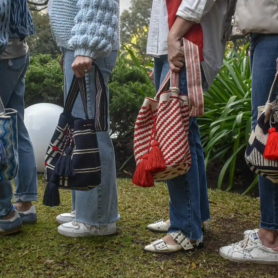 Lifestyle photo of large colors Wayuu bags, handmade in Colombia