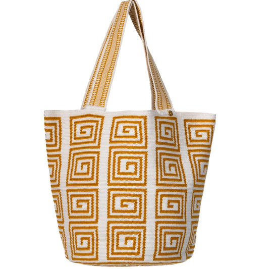 Handcrafted white and mustard striped Wayuu crochet bag made by indigenous artisans in Colombia