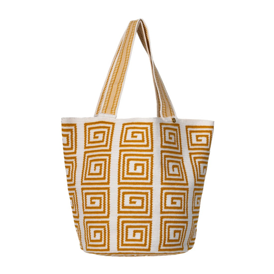 Handcrafted white and mustard striped Wayuu crochet bag made by indigenous artisans in Colombia