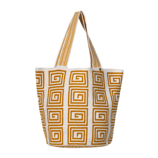 Handcrafted white and mustard striped Wayuu crochet bag made by indigenous artisans in Colombia