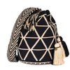 Handcrafted black & beige striped Wayuu crochet bag made by indigenous artisans in Colombia