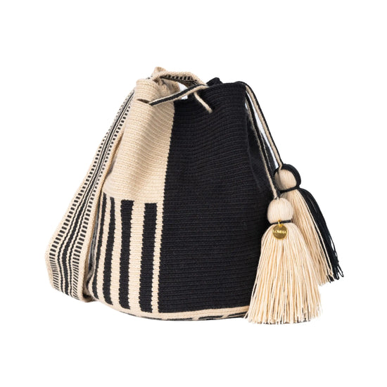 Handcrafted black & beige striped Wayuu crochet bag made by indigenous artisans in Colombia