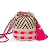 Handcrafted pink & black Wayuu crochet bag made by indigenous artisans in Colombia
