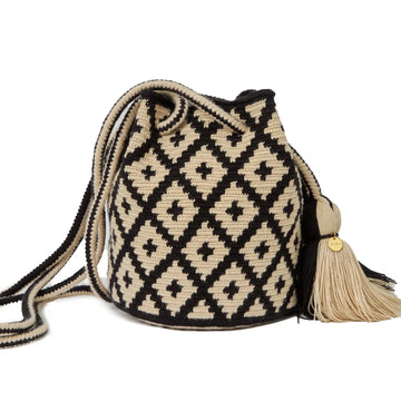 Handcrafted beige & black Wayuu crochet bag made by indigenous artisans in Colombia