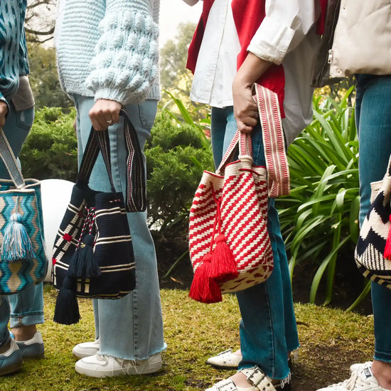 Lifestyle photo of large colors Wayuu bags, handmade in Colombia