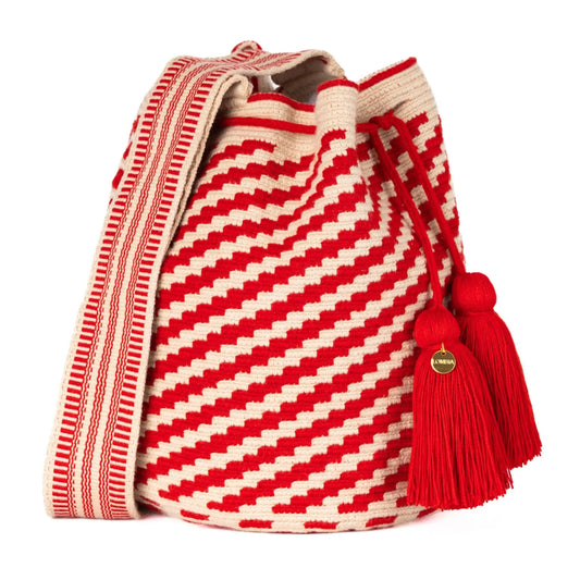Handcrafted red & beige striped Wayuu crochet bag made by indigenous artisans in Colombia