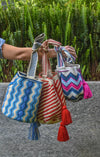 Handcrafted colorful Wayuu crochet bag made by indigenous artisans in Colombia
