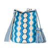 Handcrafted blue & beige striped Wayuu crochet bag made by indigenous artisans in Colombia