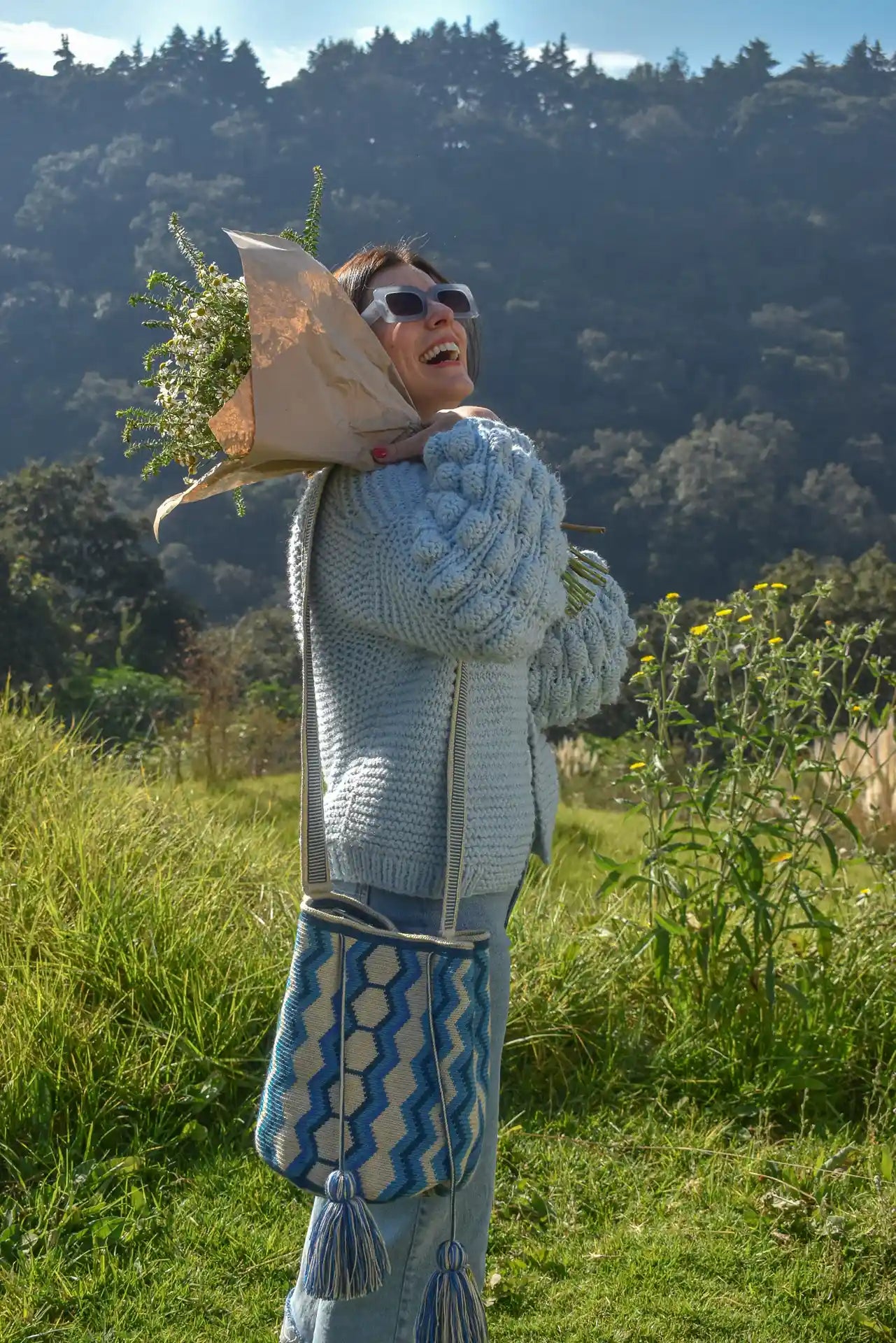 Nishu large Wayuu crochet bag in blue and beige stripes, handcrafted by Colombian artisans