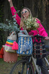 Lifestyle photo of large colors Wayuu bags, handmade in Colombia