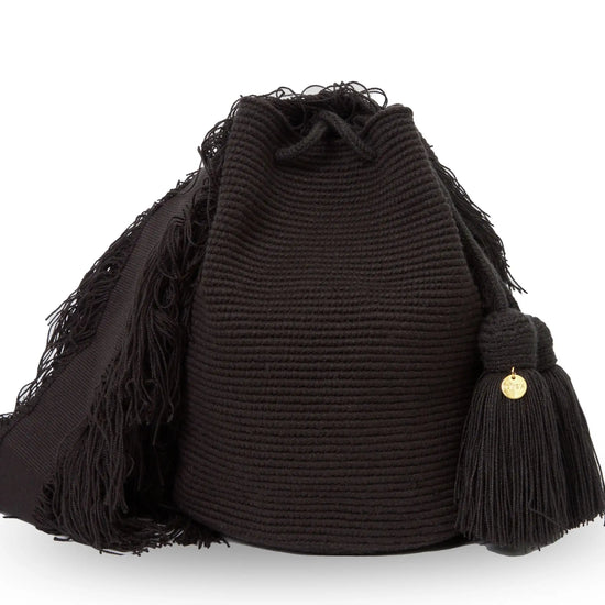 Handcrafted  black main Wayuu crochet bag made by indigenous artisans in Colombia